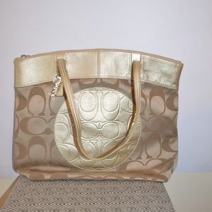 Gold original coach bag